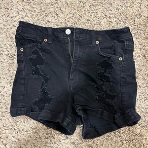 6 black ripped shorts